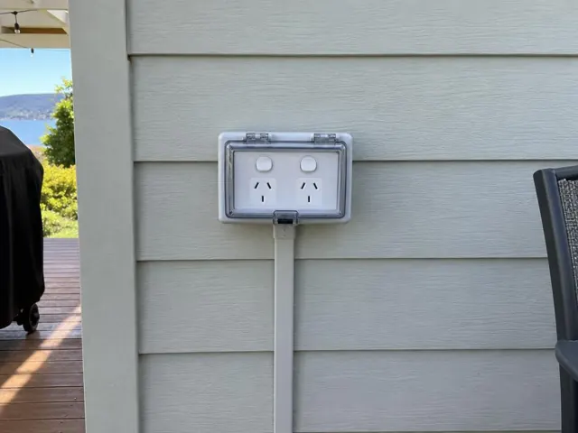Double outdoor power point on weatherboard exterior wall beside a deck in Ettalong Beach